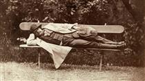Nadar Lying On A Bench With A Cat - 納達爾