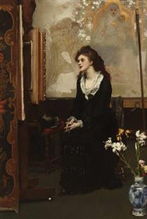 In the studio - young woman pensively looks at a picture on an easel - Karl Gussow