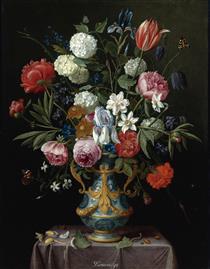 Still life of irises, peonies, narcissi, a tulip and other flowers in a blue-and-white porcelain vase with ormolu mounts on a draped pedestal - Jan van Kessel the Elder