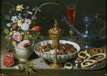 Still Life with Nuts, Candy and Flowers - Clara Peeters